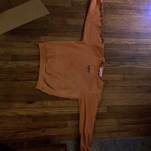 black and orange off white x Vlone hoodie.